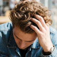 Hair Atelier Matte Wax used for textured matte hairstyle look for men
